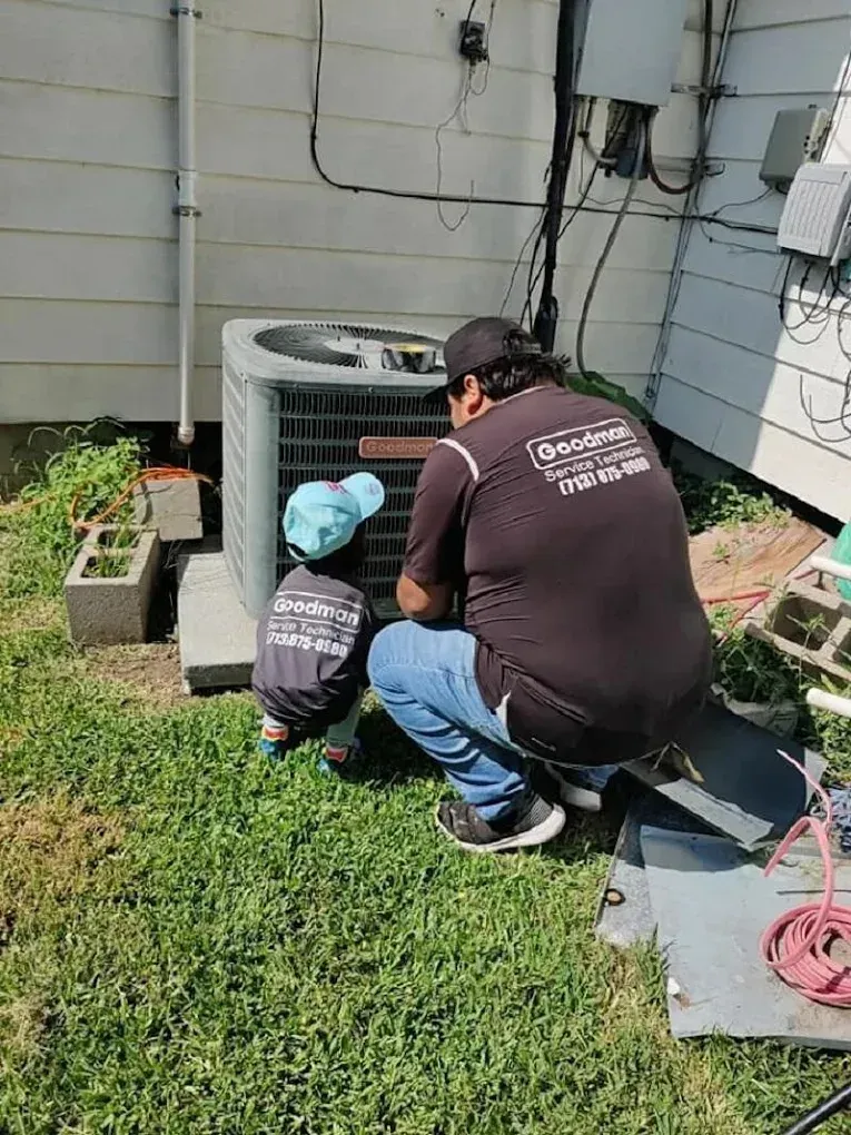 Technician performing maintenance on an air conditioning unit indoors, showcasing effective repair solutions